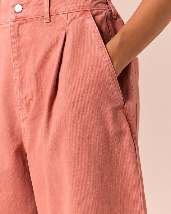 model wears bonnie clay pink denim jeans