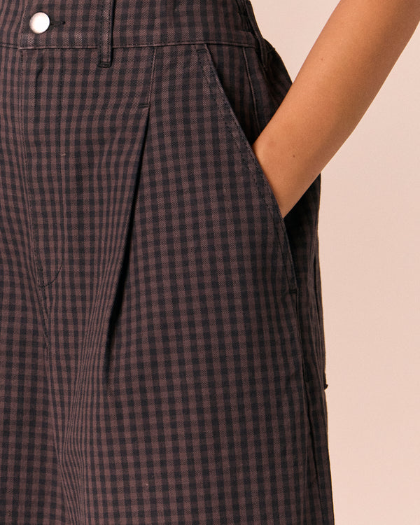 model wears bonnie mulberry gingham denim jeans