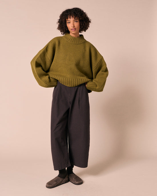 model wears bonnie mulberry gingham denim jeans right