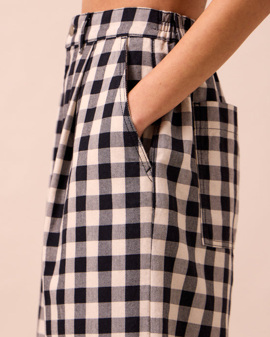 model wears bonnie black and white denim jeans