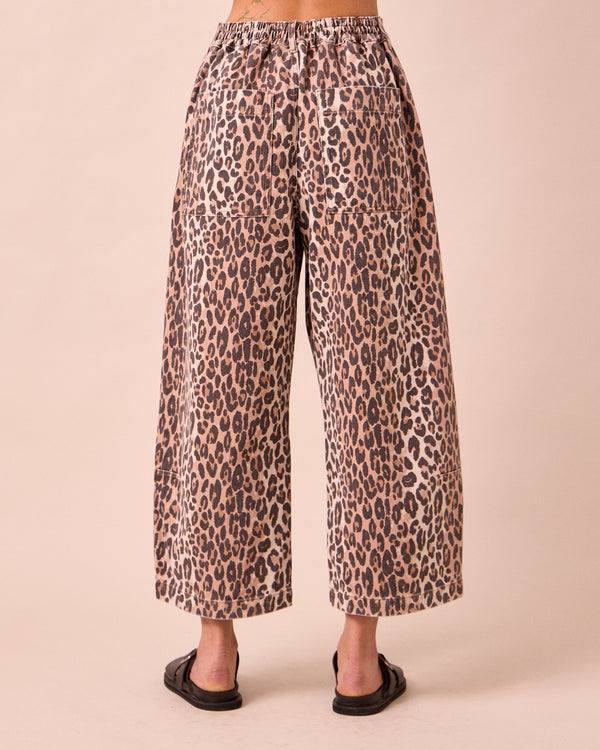 model wears bonnie leopard print denim jeans back