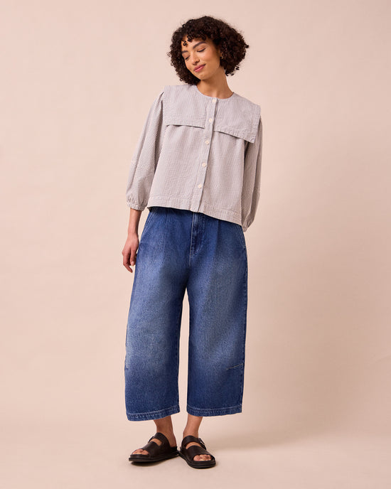 model wears bonnie mid blue denim jeans right