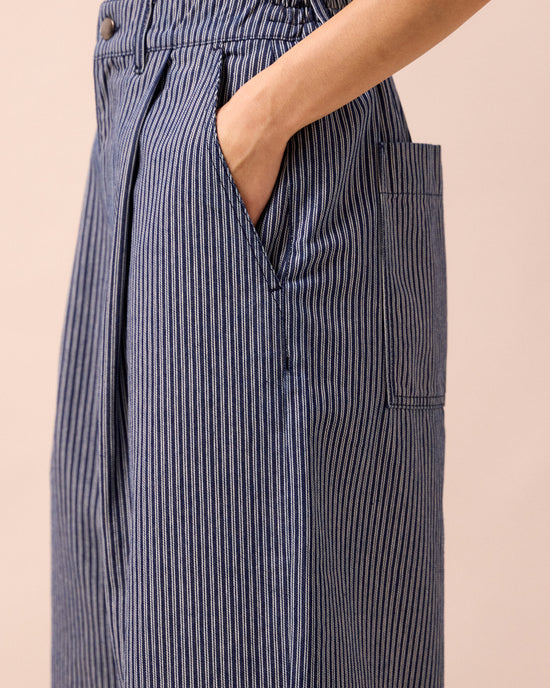 model wears bonnie navy pinstripe denim jeans