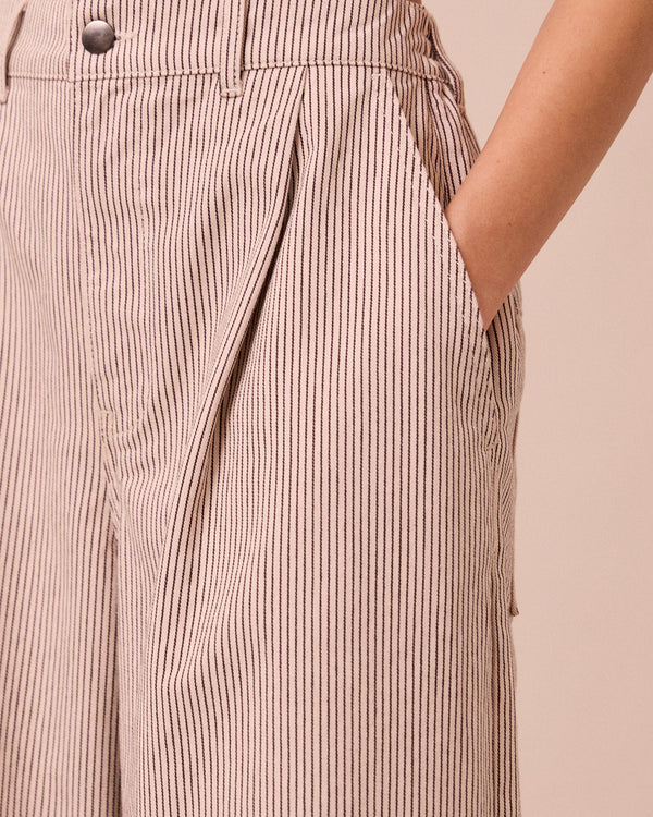 model wears bonnie shell hickory stripe denim jeans