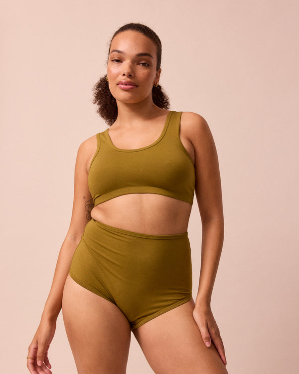 model wears golden olive full coverage jersey knicker