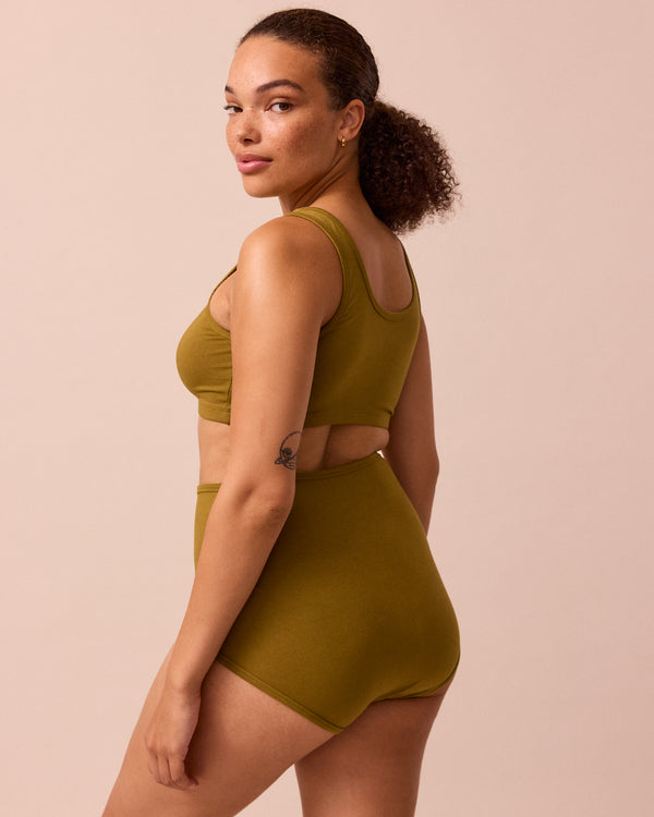 model wears golden olive full coverage jersey knicker