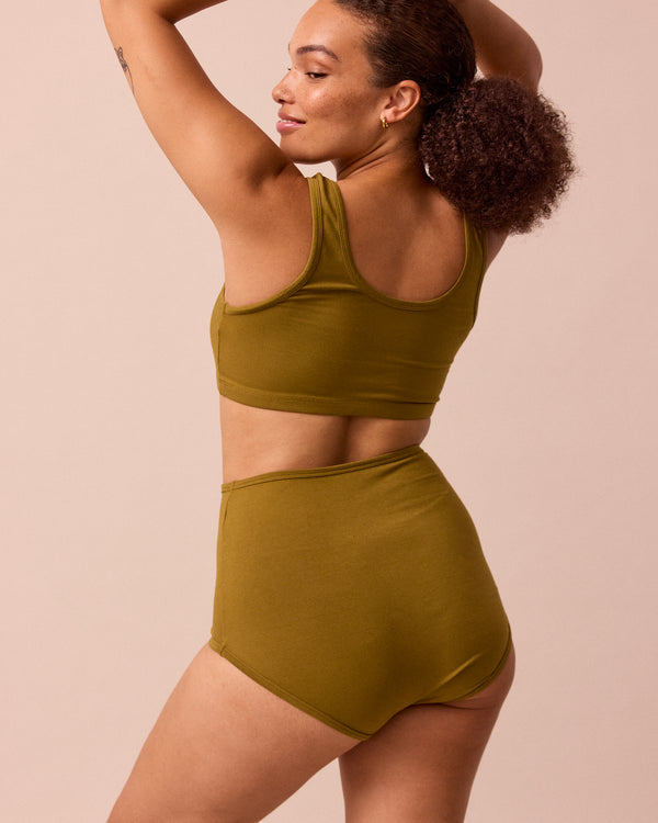 model wears golden olive full coverage jersey knicker