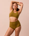 model wears golden olive full coverage jersey knicker