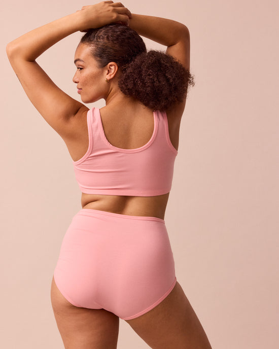 model wears petal pink full coverage jersey knicker