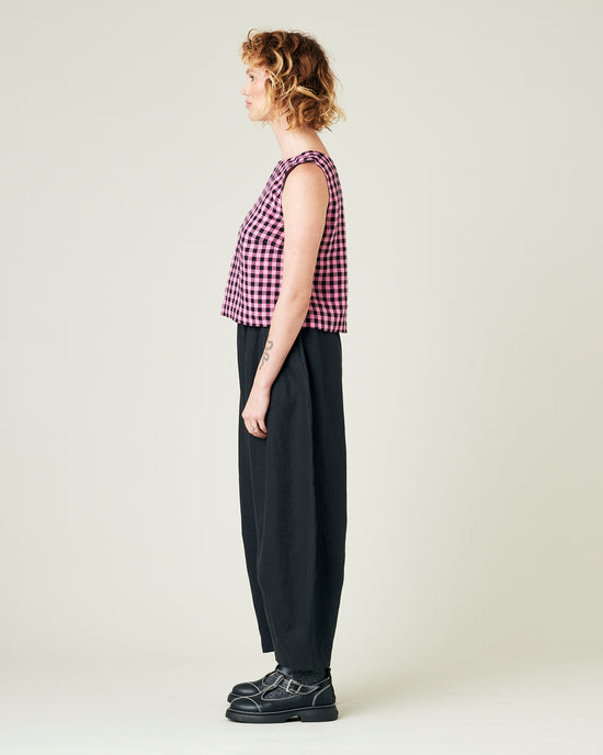 model wears black daisy linen trousers 