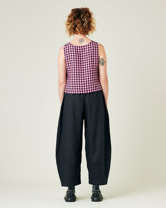 model wears black daisy linen trousers 