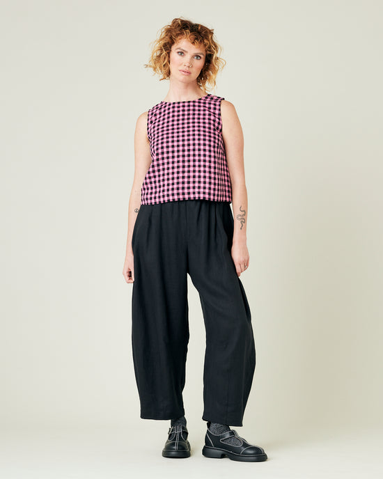 model wears black daisy linen trousers 