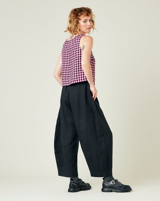 model wears black daisy linen trousers 