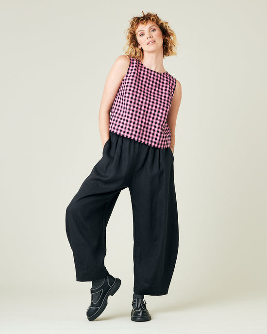 model wears black daisy linen trousers 