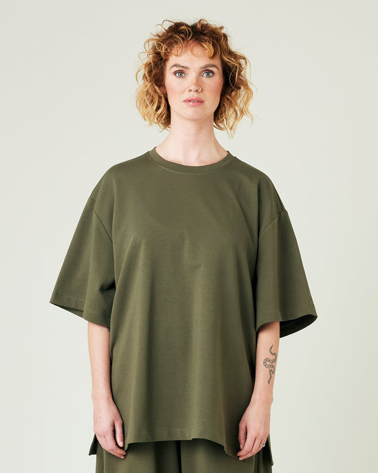 model wears olive jersey jude top