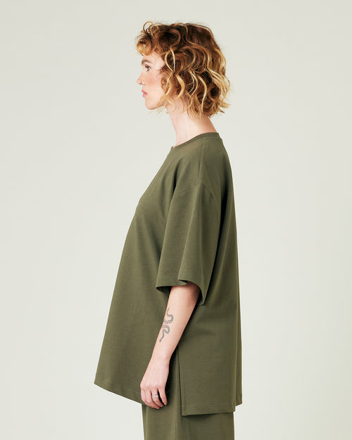 model wears olive jersey jude top