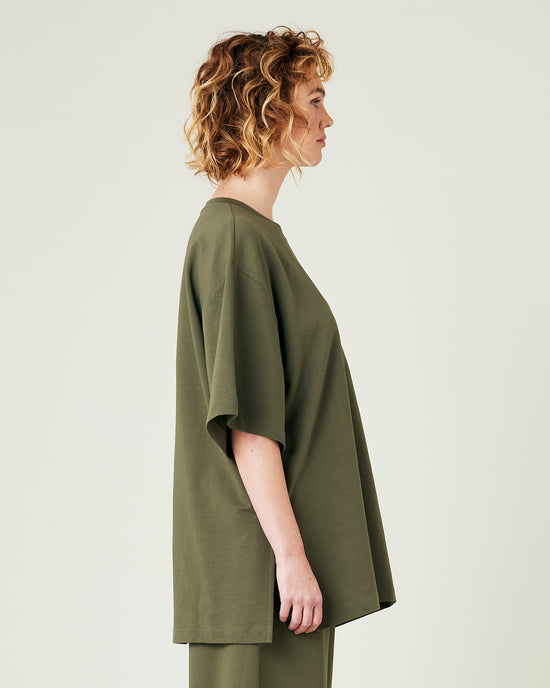 model wears olive jersey jude top