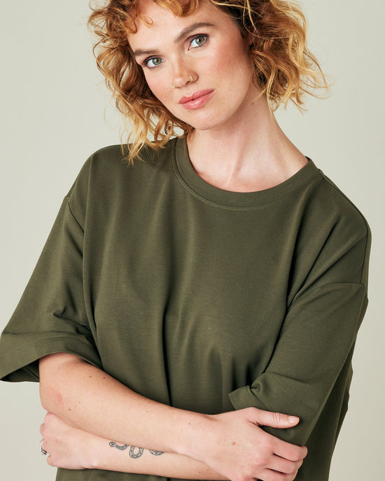 model wears olive jersey jude top