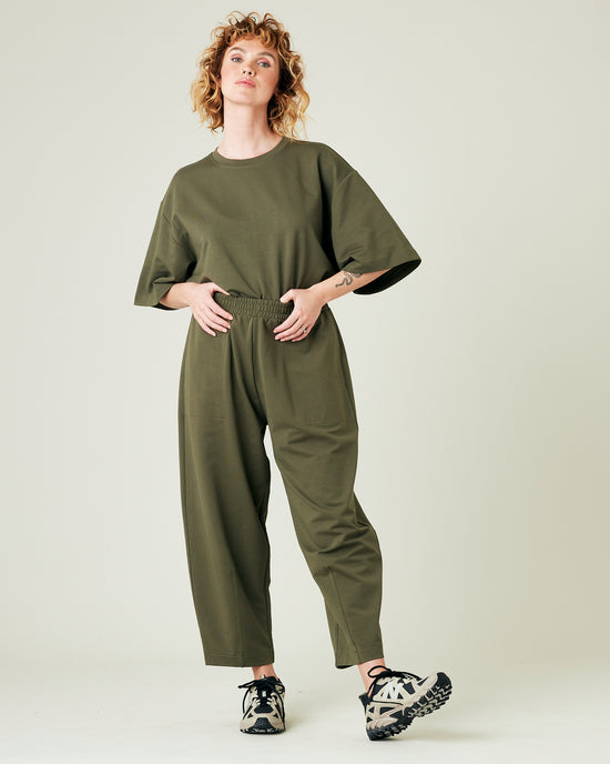 model wears olive jersey jude top