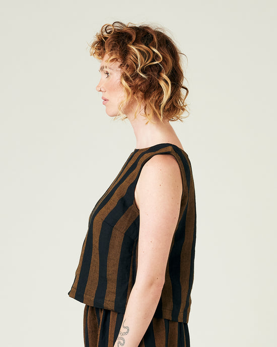 model wears rust stripe linen esme top