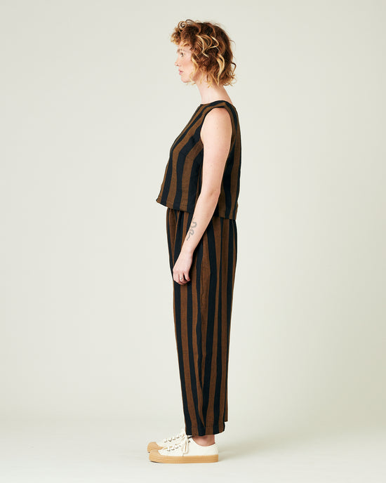 model wears rust stripe linen mabel trousers