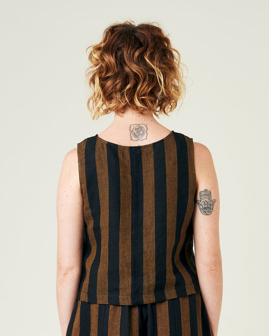 model wears rust stripe linen esme top