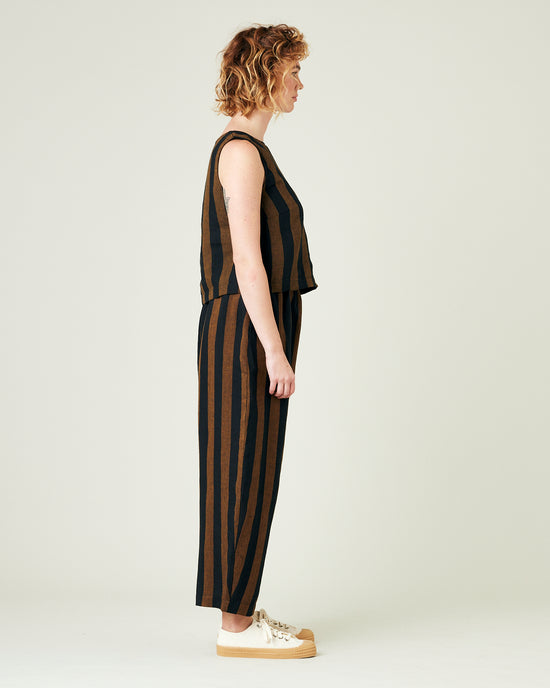 model wears rust stripe linen mabel trousers