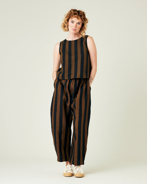 model wears rust stripe linen mabel trousers