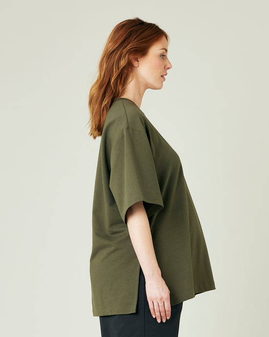 pregnant model wears olive jersey jude top