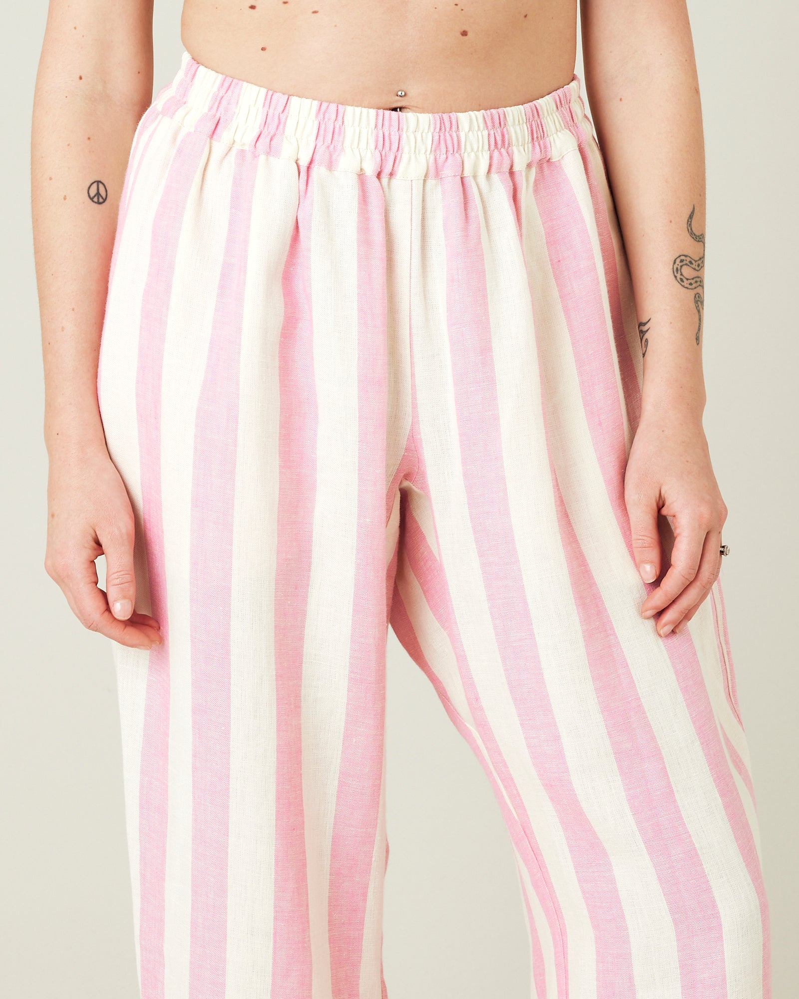 Shops pink and white striped trousers