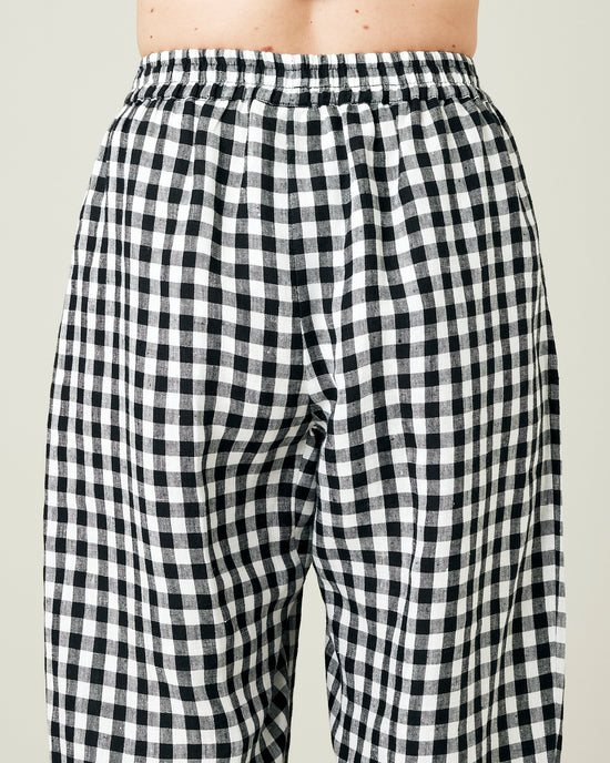 model wears black and white gingham ultimate pj linen trousers