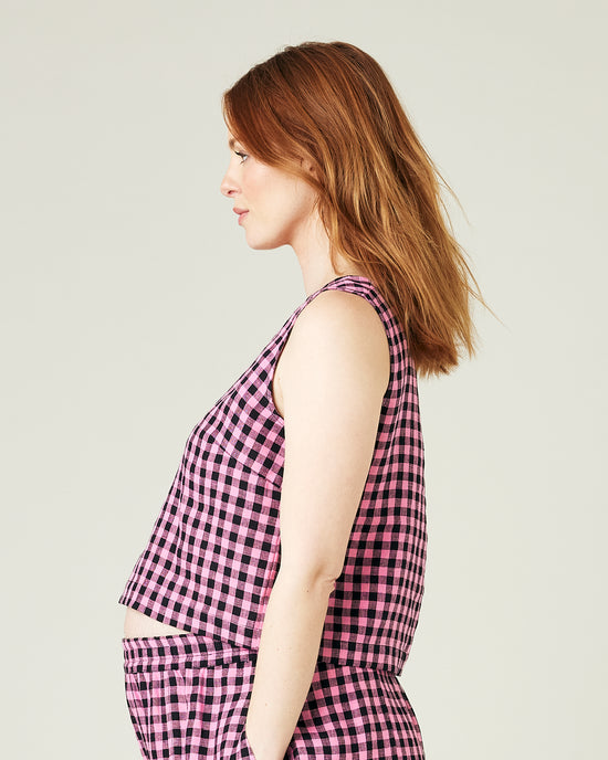 pregnant model wears pink and black check linen esme top