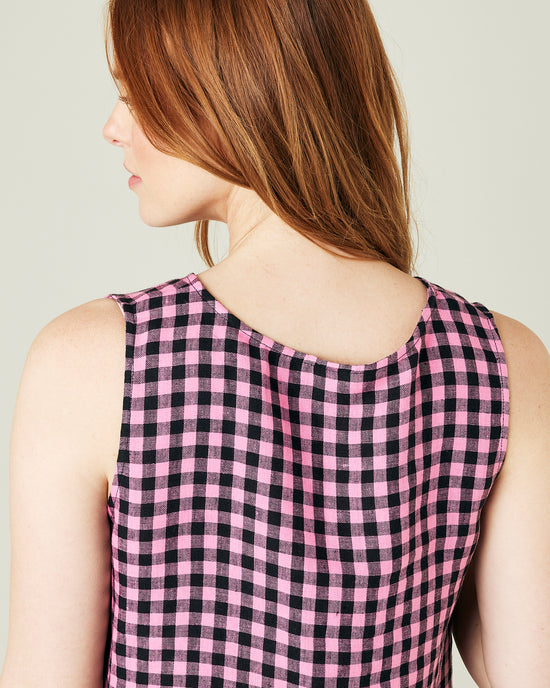 pregnant model wears pink and black check linen esme top