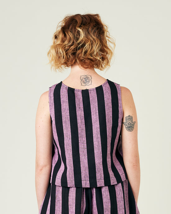 model wears pink and black stripe linen esme top