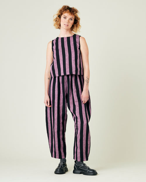 model wears pink and black stripe linen esme top