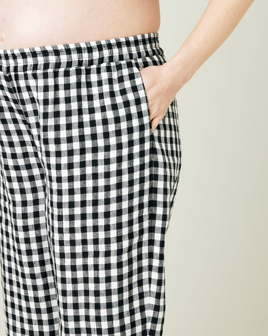 pregnant model wears black and white gingham ultimate pj linen trousers