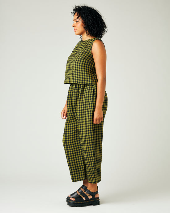 model wears green gingham linen mabel trousers