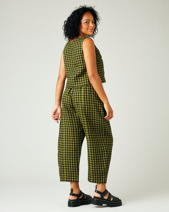 model wears green gingham linen mabel trousers