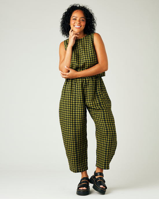 model wears green gingham linen mabel trousers