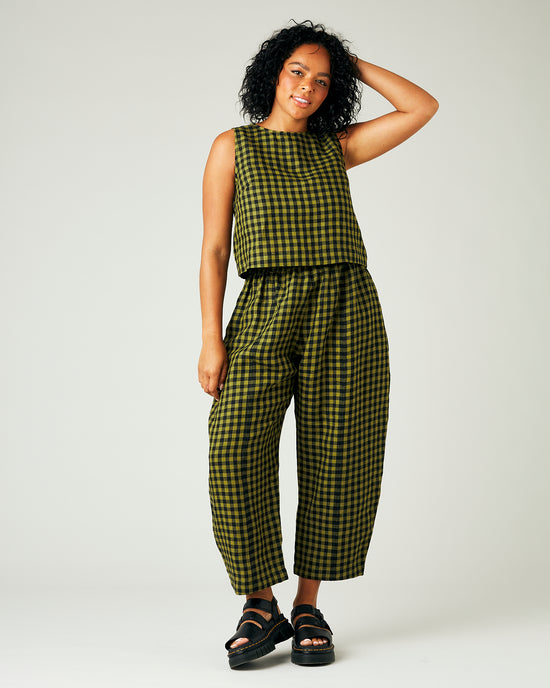 model wears green gingham linen mabel trousers