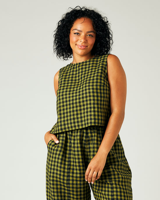 model wears green gingham linen esme top