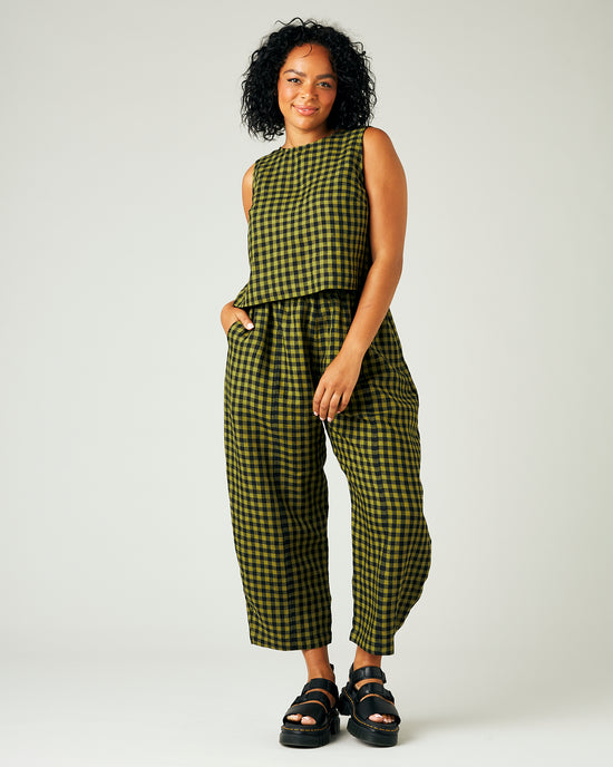 model wears green gingham linen esme top