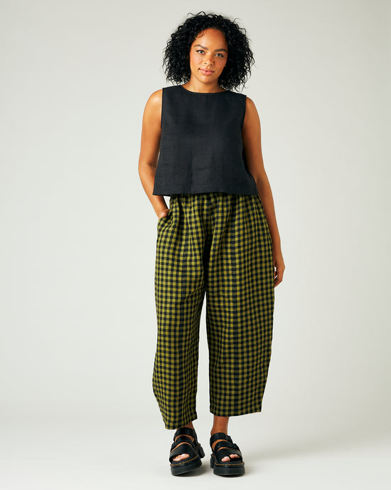 model wears green gingham linen mabel trousers