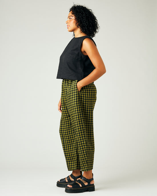 model wears green gingham linen mabel trousers