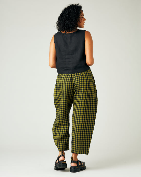 model wears green gingham linen mabel trousers