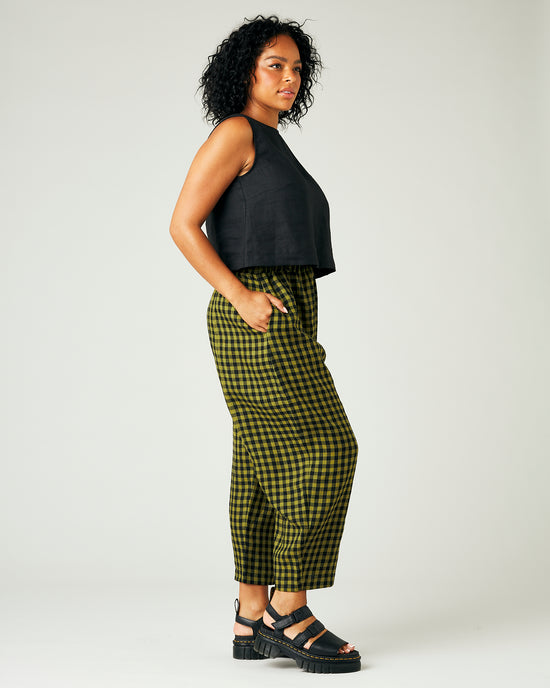 model wears green gingham linen mabel trousers