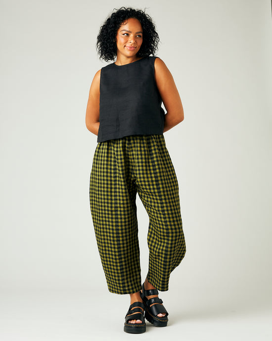 model wears green gingham linen esme top