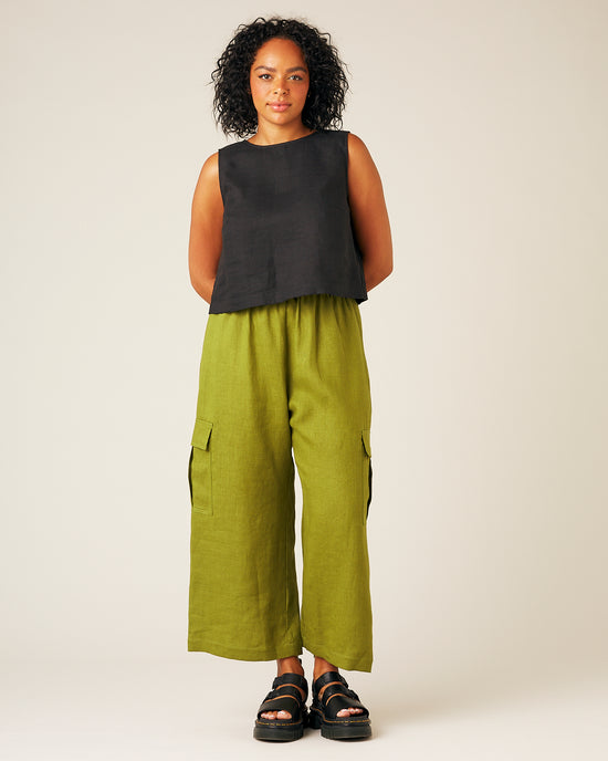 model wears pea pod linen trousers