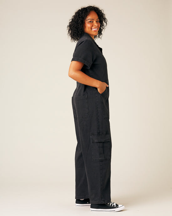 model wear black denim charlie jumpsuit