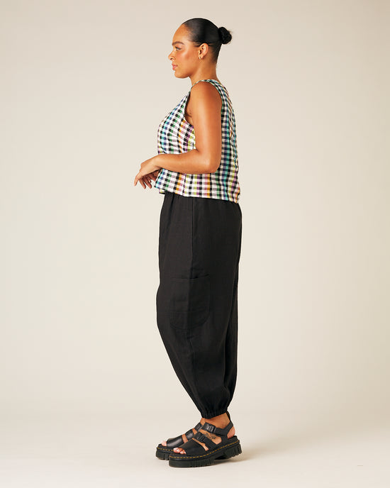 model wears black linen yoli trousers